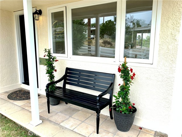 Detail of front porch, freshly painted.