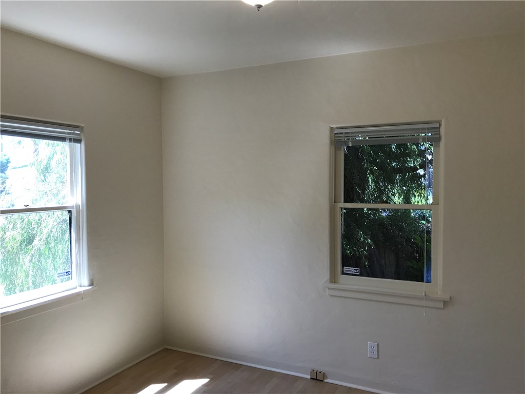 Bedroom #1 with view to rear yard