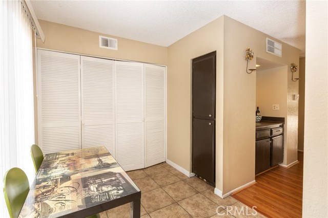 Laundry area behind shutter doors