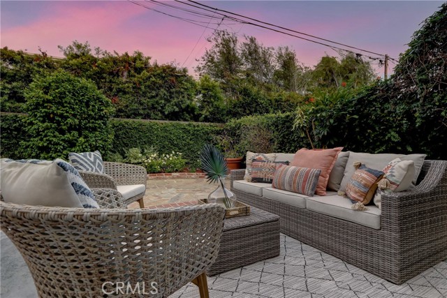 PRIVATE ENCLOSED BACKYARD PATIO AT DUSK
