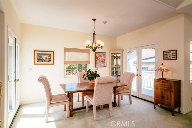 Dining room with access to decks on both sides