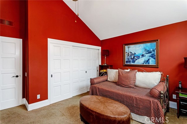 View of one of the three bedrooms upstairs.