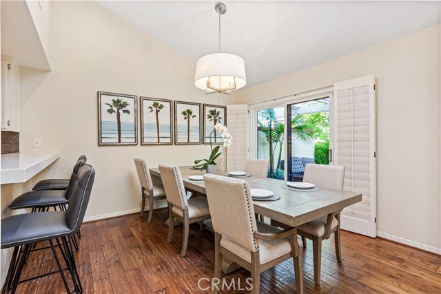 Hard wood Floors in Living room  & Dining room lead out to Patio