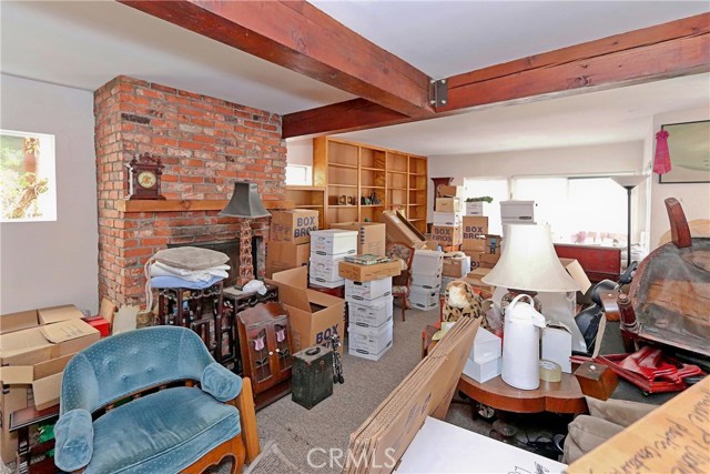 Front Unit- Family Room Fireplace , built in cabinets and shelving