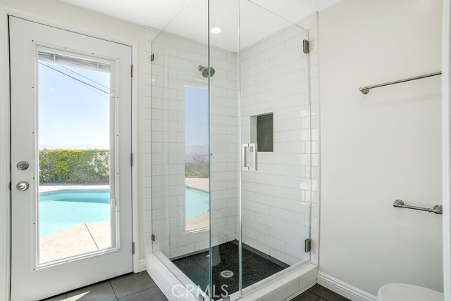 Master Bedroom - 3/4 attached bath with door leading to pool