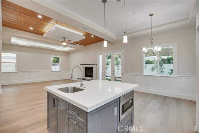 KITCHEN ISLAND WITH VIEW INTO LIVING ROOM