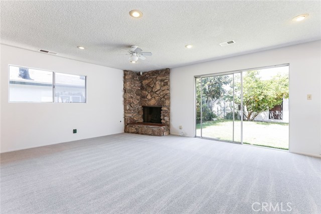 Family Room, gas fireplace to back yard