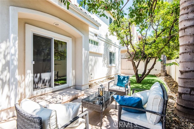 Private patio off family room with the perfect balance of sun and shade.