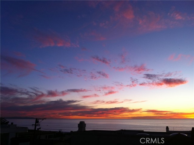 Wispy clouds across a fire-lit sky...