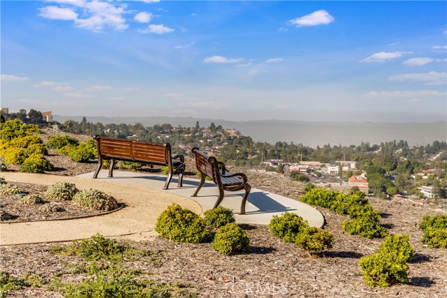 Breathtaking views along the walking paths with benches. Amenites also include a dog park and Raised beds gardening,