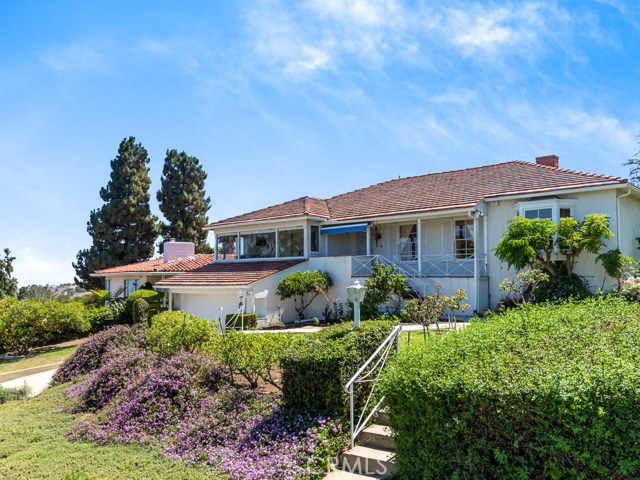 Front entrance with rose garden