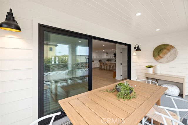 Extend the Indoor Activities Onto the Covered Patio