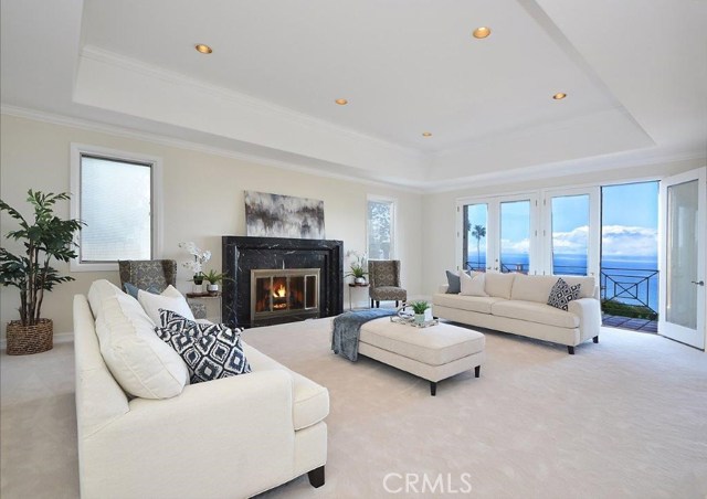 Living Room with Fireplace & Balcony