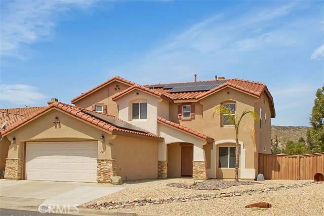 Gorgeous 5 bedroom 3 bath home with easy maintenance, drought tolerant, decorative landscaping.  New stacked stone accents bring the curb appeal to the next level