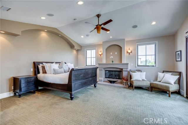 Master Suite with gas fireplace and private balcony