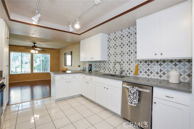 Remodeled kitchen w/quartz counters, full back splashes, self closing cabinet doors & drawers and more.