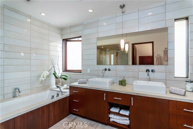 Master Bathroom with Mahogany cabinets and Ann Sacks tiles