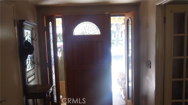 Custom entry door with side screens for ventilation