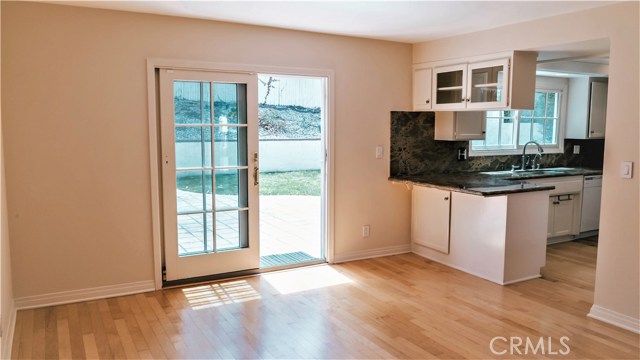 Dining room opens to the backyard and kitchen