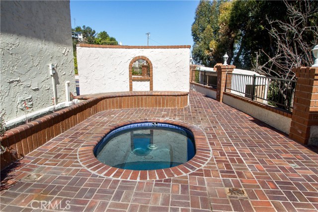 Sauna on side of house for privacy.  MWD drinking water tank is to the right in this picture.  A perfect neighbor.