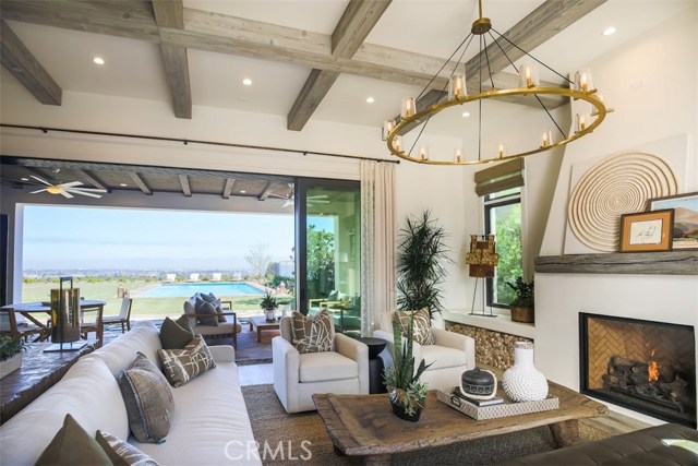 A2 model home interior of grea troom, looking into backyard,same floorplan as this home being built at 18 Phillips Ranch Road.Note, backyards will all be different, depending upon location & view.