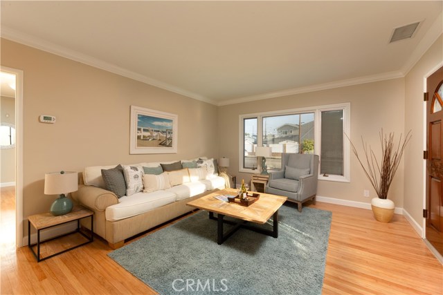 crown molding added, pella dual pane windows with blinds between the panes, refinished original hardwood floors