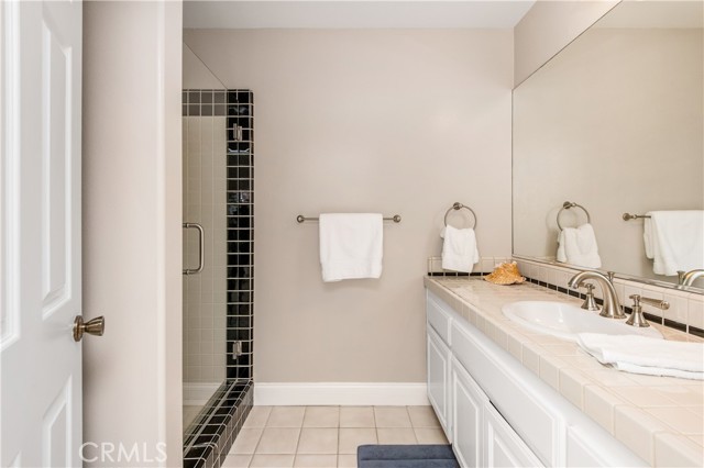 Bedroom 3: bathroom with large shower.