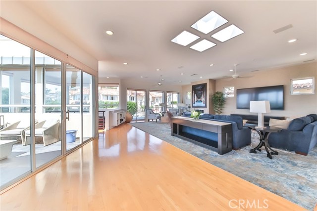 view of living room with sliding glass doors to balcony