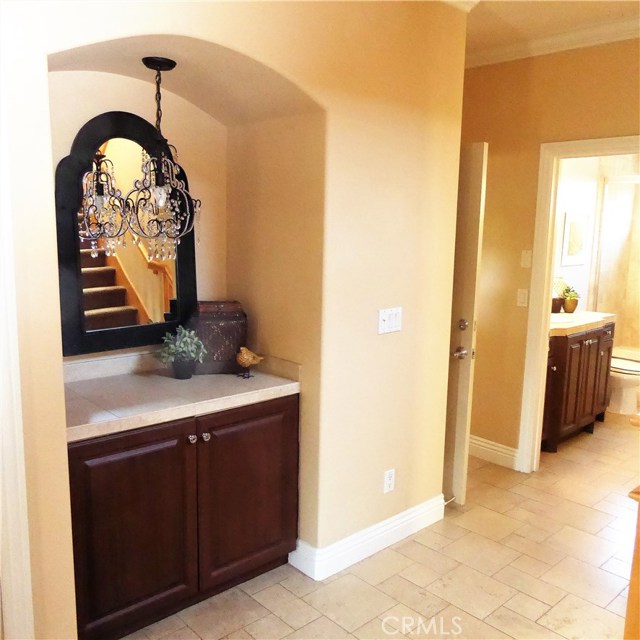 Entry foyer alcove and travertine decor