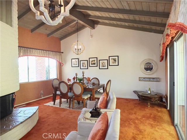 The view of the dining area from the kitchen.  THe host is always included in the conversation