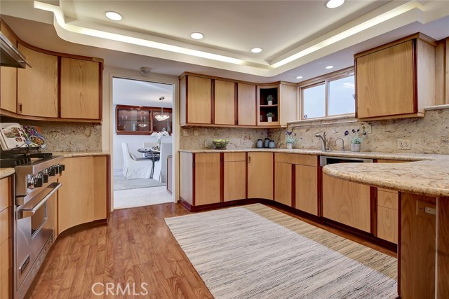 Lovely gourmet kitchen remodeled in approx 1996. Viking gas range. Subzero refrigerator. Miele dishwasher.