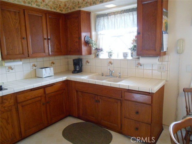 Lots of Counter Space. Nice Bright Window and Lots of Cabinet Storage Space.
