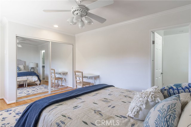 Spacious guest suite with mirrored closet