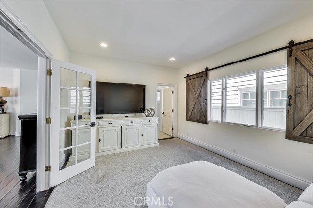 Bedroom #2 with view into Jack n Jill bathroom. West facing windows provide lots of natural sunlight.
