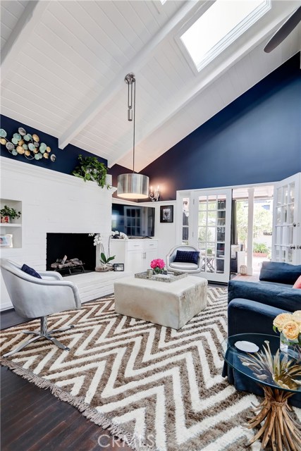 Filled with light from both french doors, sidelights and skylights this great room is one you will never want to leave!