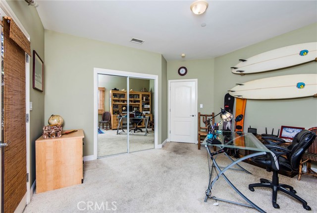 Office or fourth bedroom leading to rear yard.