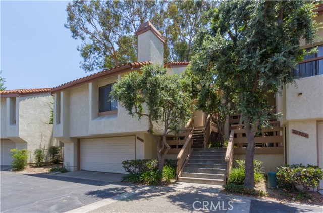 Highly sought after La Mancha townhome. This architecturally interesting 3 bedroom 2 bath home... Primary Photo for Listing #OC17163420
