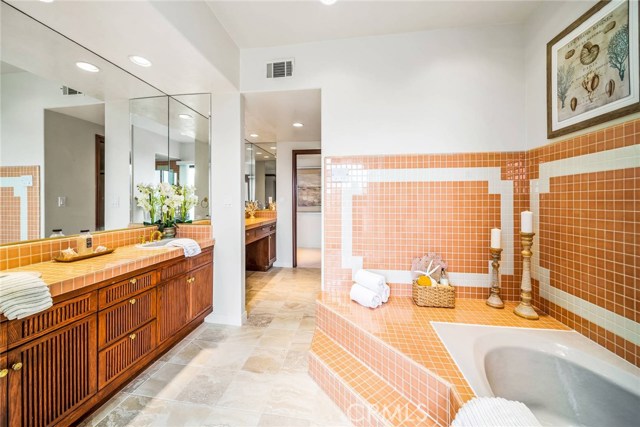 Huge master bath with soaking tub, shower, two vanities...