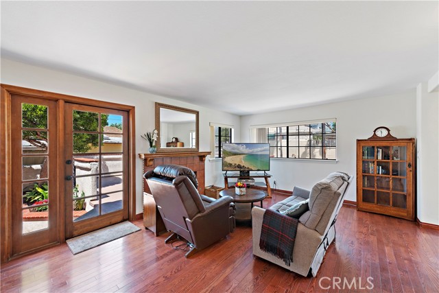 Family room with French doors to yard and private deck