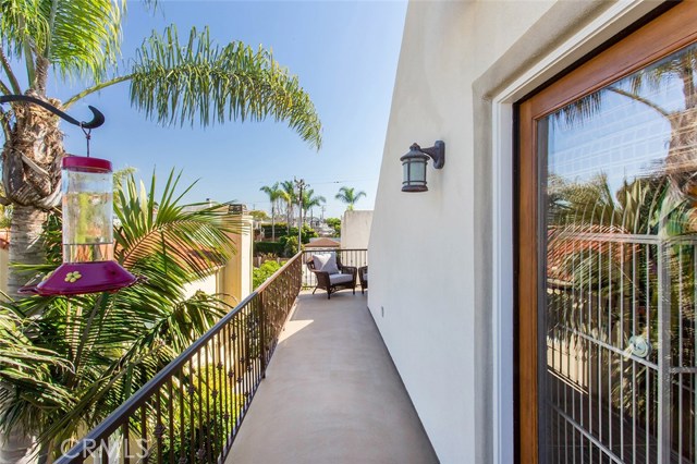 This is the homes third over-sized balcony and leads to the stairway to the top deck.