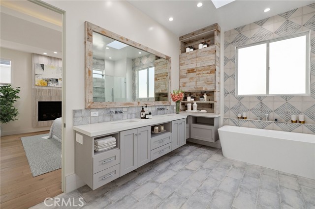 Spacious master bath expresses rustic modern flair