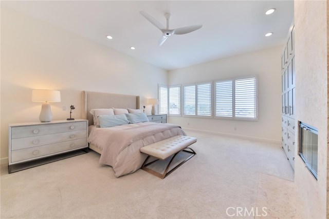 master bedroom with new paint and carpeting