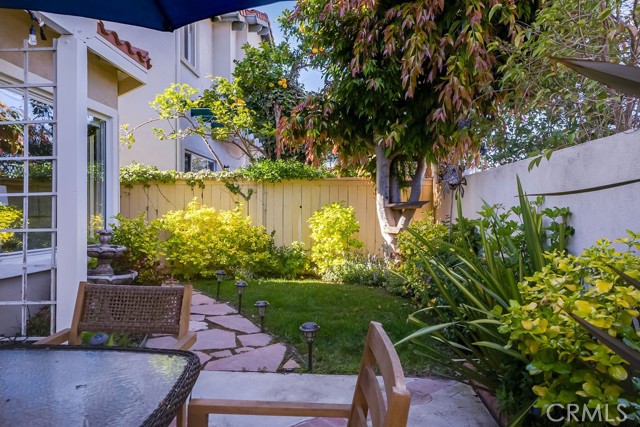 Grassy area, Fountain and mature landscaping