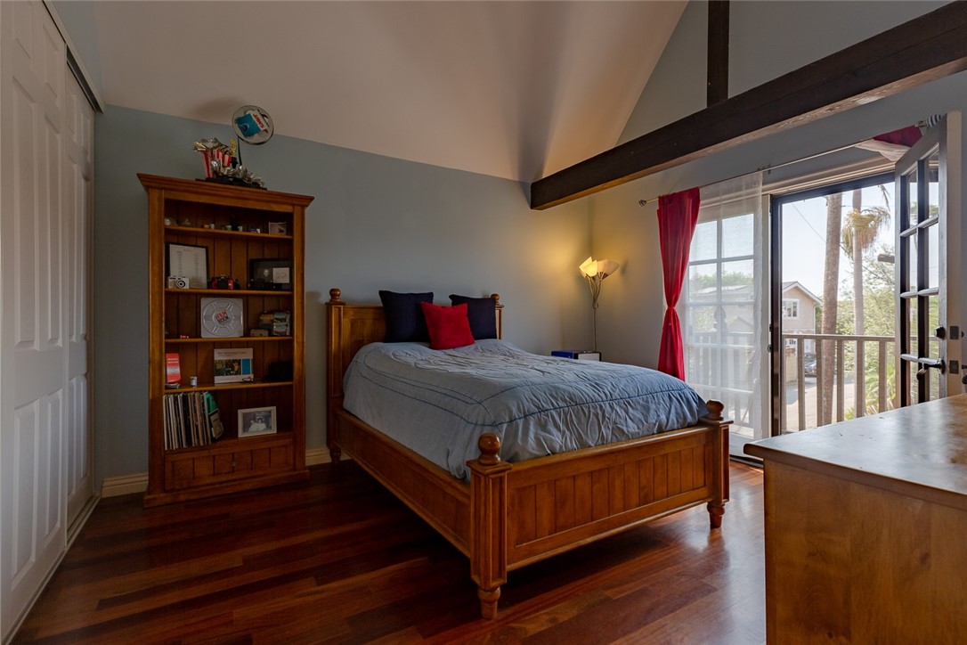 French doors lead to balcony with ocean view.