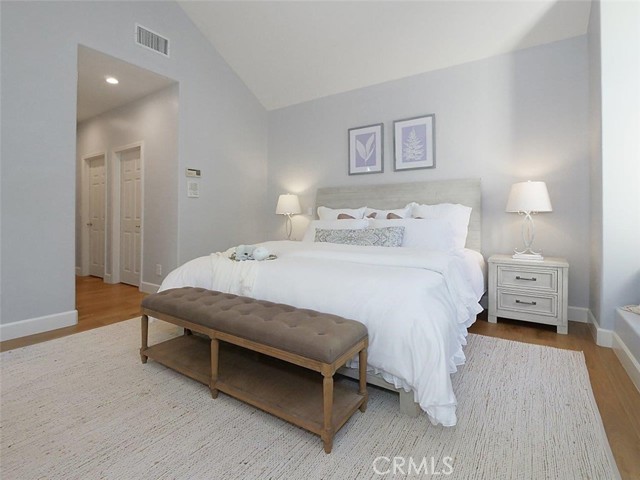 His and Hers walk-in closets (on the left in picture) in master bedroom
