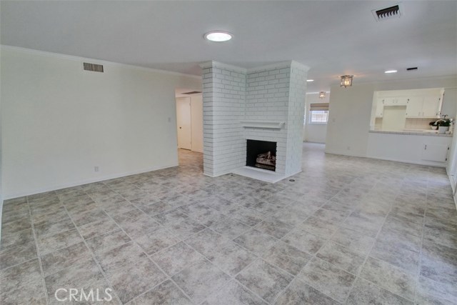 Formal living room with gas fireplace