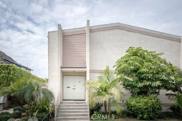 Front of Building.  Walkway to unit is on left.