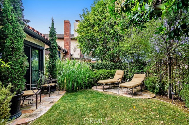 Enjoy this dreamy seating or lounging area that has direct access from the master bedroom suite.