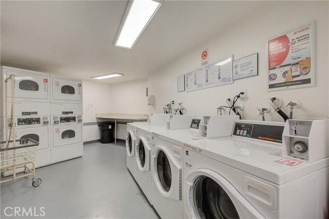 Laundry room in your building....no steps necessary, you can take an elevator from garage to laundry to unit!