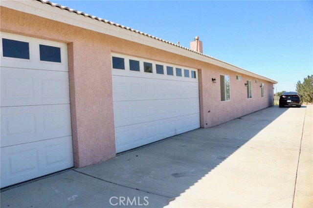 3 car garage, plenty of parking space and RV access